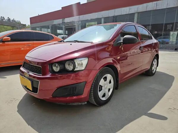 The Used car 2011 Red Chevrolet Aveo for sale.